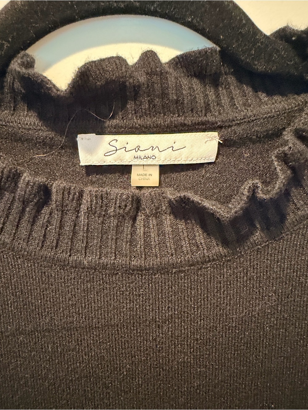 Sioni Black Ruffle Turtleneck Sweater